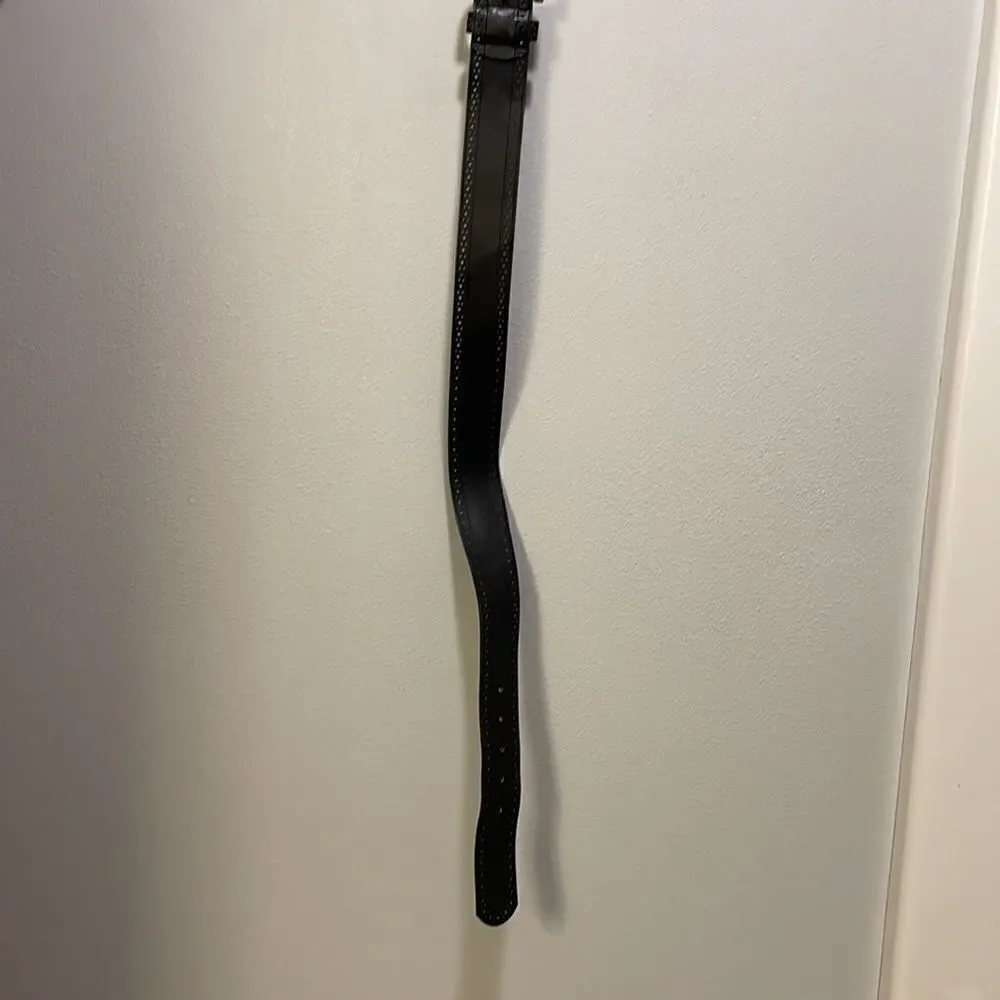 Woman’s black leather belt